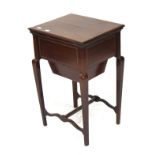 A late 19th/early 20th century mahogany sewing table.