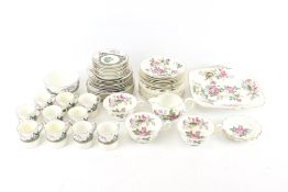 An assortment of vintage china tea and coffee sets.