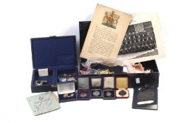 An assortment of military and civil service collectables.