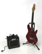 Ashton electric guitar and a GA10 practice amp. Comes with instrument stand.