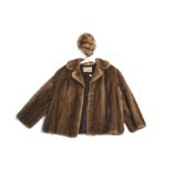 A womans half length vintage mink fur coat and hat.