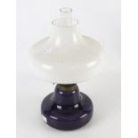 A 20th century oil lamp.