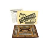 An American 'Autobridge' playing board together with instructions. L38.