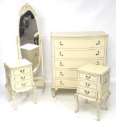 A four piece suite of bedroom furniture in the French style.