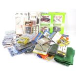 A collection of OO Gauge model railway accessories.