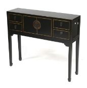 A Chinese style black lacquer console table.