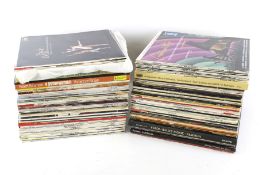 A collection of vintage vinyl records. Including Ballet music, Neil Diamond, Nancy Sinatra, etc.