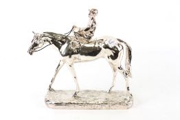A model of a horse and jockey.