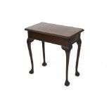 A mahogany rectangular side table. With ball and claw feet.