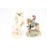 Two contemporary ceramic figurines.
