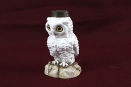 A vintage German ceramic lamp base modelled as a snowy owl.