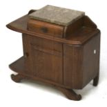 A small early 20th century oak hall cabinet with marble top.