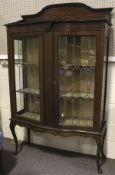 A 20th century display cabinet.