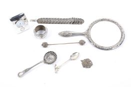 An assortment of silver and white metal items.