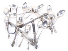 A small collection of silver teaspoons,