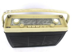A vintage Bang & Olufsen Beolit 609 FM transistor radio.
