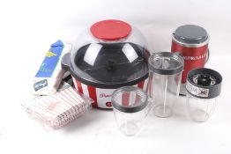 A Clas Ohlson popcorn maker and a NutriBullet set.