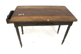 A 20th century mahogany Pembroke type table.