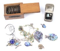A collection of early 20th century and later costume jewellery including a rolled-gold round locket.