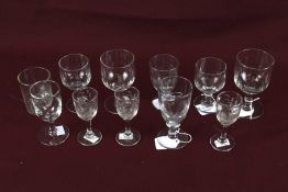 Eleven vintage drinking glasses. Of various sizes and patterns, Max.