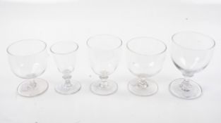 Five 19th Century drinking glasses including rummer. All handblown, of various designs, Max. H12.