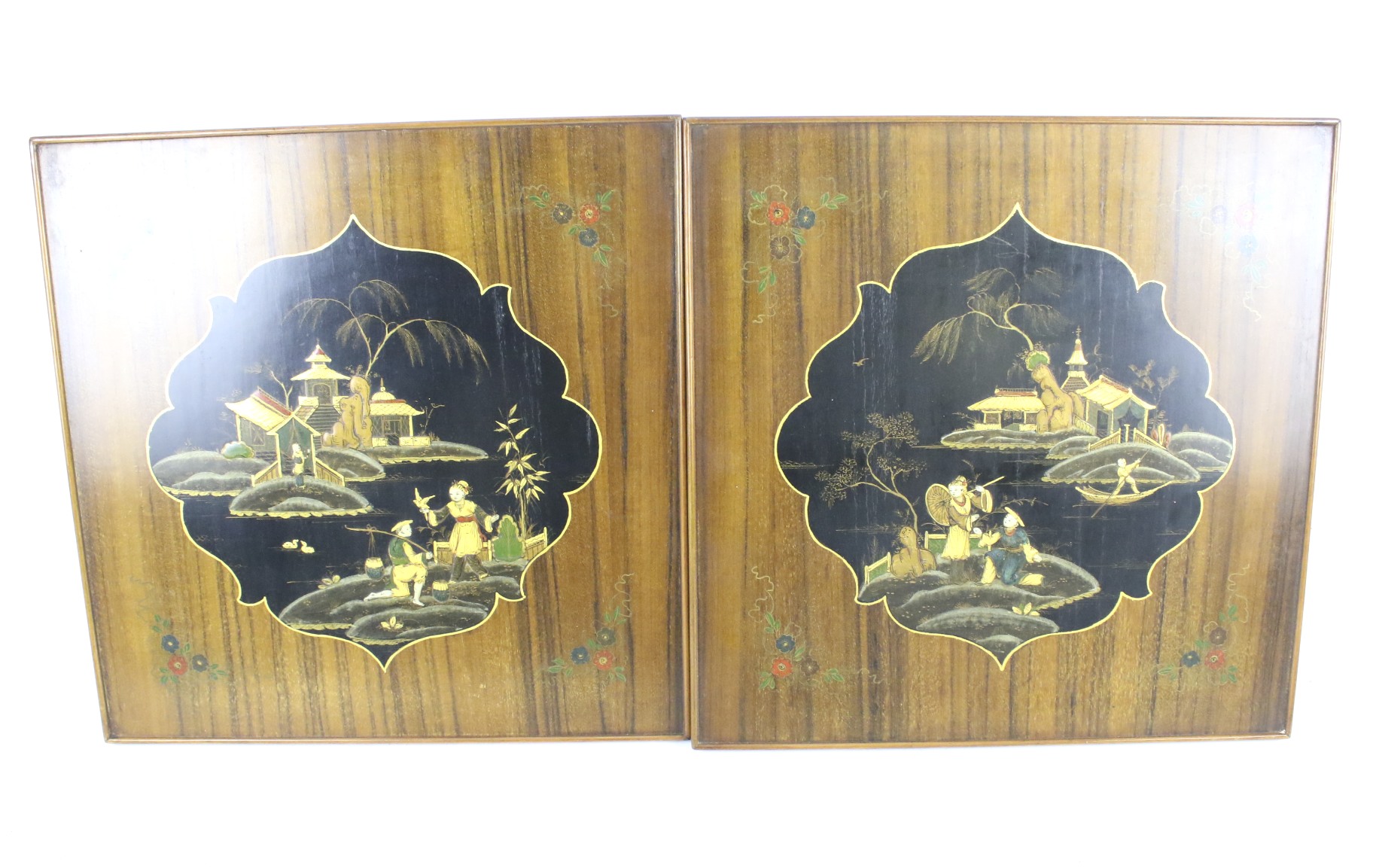 A pair of Chinese lacquered panels.