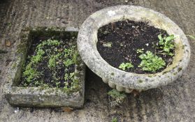 Two composite stone garden planters.
