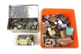 An assortment of vintage watch components. Including pocket watch dials, bezels, etc.