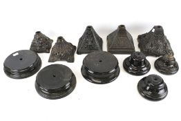 A collection of cast metal and ceramic oil lamps bases. Including FS&Co., A. L. Co., etc. Max.