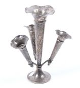 A late 19th/early 20th century multi-trumpet shape silver table centre.