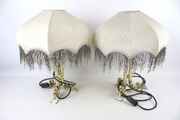 A pair of contemporary gilt metal table lamps.