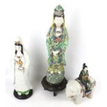 Three oriental figures.