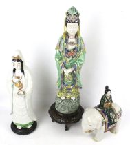 Three oriental figures.