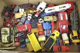 An assortment of playworn diecast. Including a Dinky Fire Engine, Matchbox Scammel Tractor, etc.