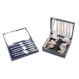 Two boxed sets of silver plated dining implements.