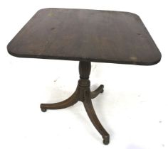 A Regency mahogany tilt top table.