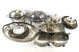 An assortment of 19th century and later silver plate. Including a pierced oval tray, tureen, etc.
