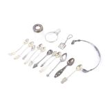 An assortment of silver, white metal and silver plate. Including spoons, a keyring, handle, etc.