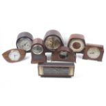 A collection of clock lenses and watch components.