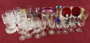An assortment of drinking glasses and glassware.
