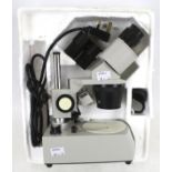 A 4X electric adjustable microscope.