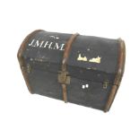 A vintage dome top trunk. With wooden and leather bindings, stamped 'J.M.H.M.