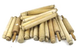 A collection of vintage wooden rolling pins.
