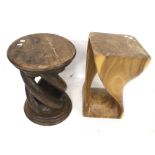 Two substantial wooden stools/stands.