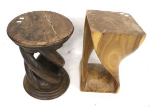 Two substantial wooden stools/stands.