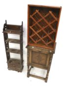 A 20th century oak sewing box, bookcase and wine rack.