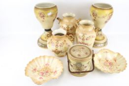 An assortment of Victorian blush ceramics. Including vases, urns, a biscuit barrel, etc.