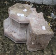A pink marble carved block.