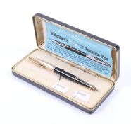 A boxed Waterman's fountain pen. With a 14ct gold nib and a rolled gold top, L14.