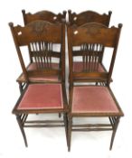 A set of four mahogany dining chairs.